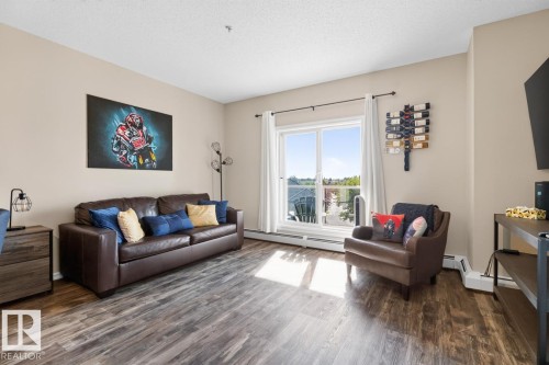 #313 226 Macewan Rd Sw, Edmonton, AB - Indoor Photo Showing Living Room