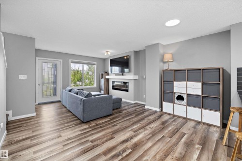128 3305 Orchards Link, Edmonton, AB - Indoor Photo Showing Living Room