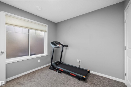 128 3305 Orchards Link, Edmonton, AB - Indoor Photo Showing Gym Room
