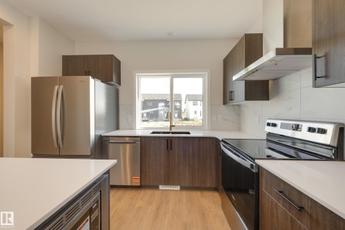 21011 25 Avenue Nw, Edmonton, AB - Indoor Photo Showing Kitchen With Stainless Steel Kitchen