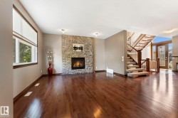 The living room has a fireplace making a gorgeous focal point - 