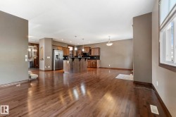 View from living room into the kitchen and dining area - 
