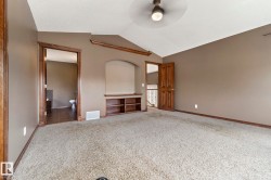 Vaulted ceilings add to the charm of this room - 