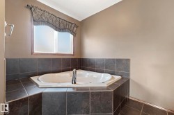 Relax in the corner jetted tub - 