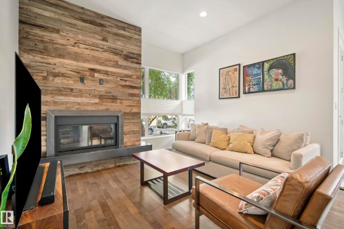 8751 83 Avenue Nw, Edmonton, AB - Indoor Photo Showing Living Room With Fireplace