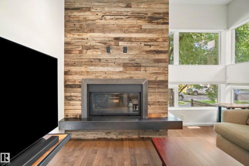 8751 83 Avenue Nw, Edmonton, AB - Indoor Photo Showing Living Room With Fireplace