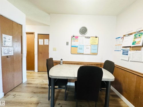 Wood-finish flooring throughout - 221 Parkview Drive, Wetaskiwin, AB - Indoor Photo Showing Dining Room