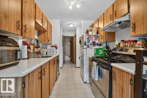 #203 10842 107 St Nw, Edmonton, AB - Indoor Photo Showing Kitchen