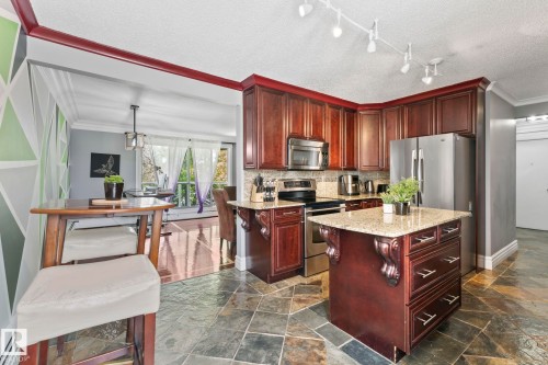 #405 10745 83 Av Nw, Edmonton, AB - Indoor Photo Showing Kitchen With Stainless Steel Kitchen