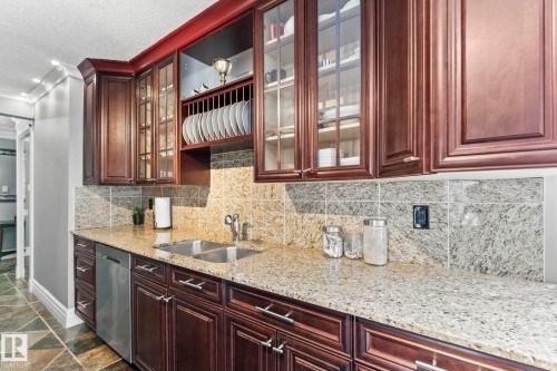 #405 10745 83 Av Nw, Edmonton, AB - Indoor Photo Showing Kitchen With Double Sink