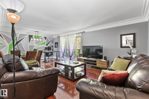 #405 10745 83 Av Nw, Edmonton, AB - Indoor Photo Showing Living Room