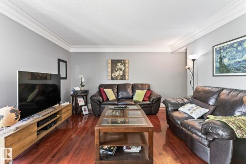 #405 10745 83 Av Nw, Edmonton, AB - Indoor Photo Showing Living Room