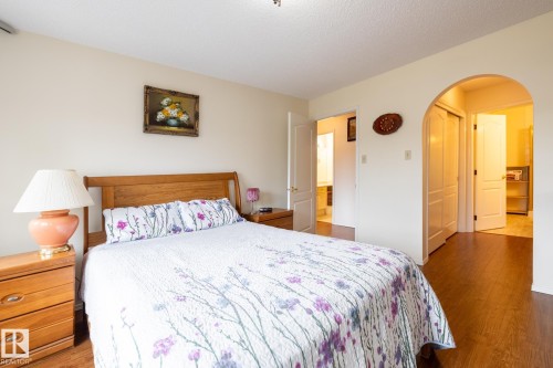 Wood-finish flooring throughout - #310 17151 94A Av Nw, Edmonton, AB - Indoor Photo Showing Bedroom