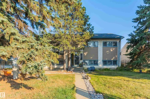 Two-story residence featuring a combination of stucco and horizontal siding - 13208 128 Avenue Nw, Edmonton, AB - Outdoor