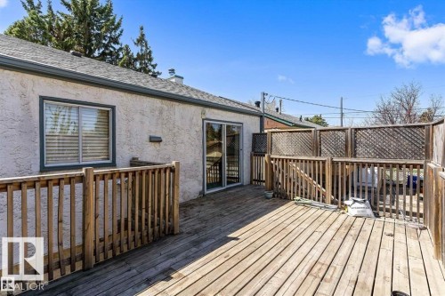 Spacious wood deck with perimeter railings and lattice privacy screens - 13208 128 Avenue Nw, Edmonton, AB - Outdoor With Deck Patio Veranda With Exterior