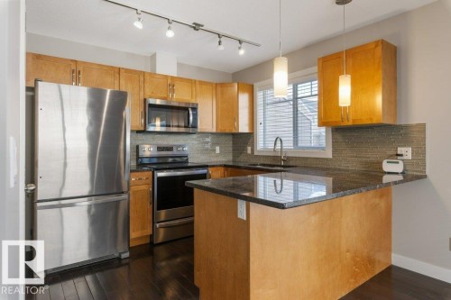 #23 7289 South Terwillegar Dr Nw, Edmonton, AB - Indoor Photo Showing Kitchen With Stainless Steel Kitchen