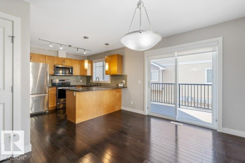 #23 7289 South Terwillegar Dr Nw, Edmonton, AB - Indoor Photo Showing Kitchen With Stainless Steel Kitchen