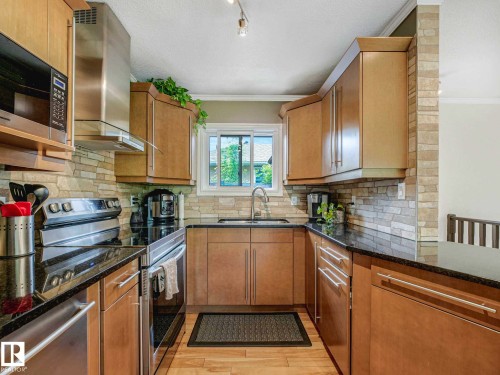 8311 96 Avenue Nw, Edmonton, AB - Indoor Photo Showing Kitchen With Double Sink