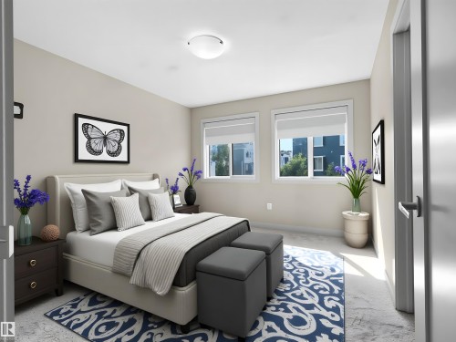 Bedroom featuring two double-hung windows with roller shades, neutral tone walls, and a ceiling-mounted light fixture - 4487 Annett Common Sw, Edmonton, AB - Indoor Photo Showing Bedroom