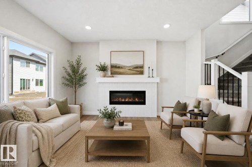 3024 Dixon Landing Sw, Edmonton, AB - Indoor Photo Showing Living Room With Fireplace