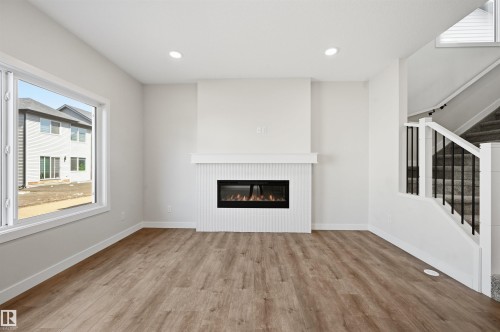3024 Dixon Landing Sw, Edmonton, AB - Indoor Photo Showing Living Room With Fireplace