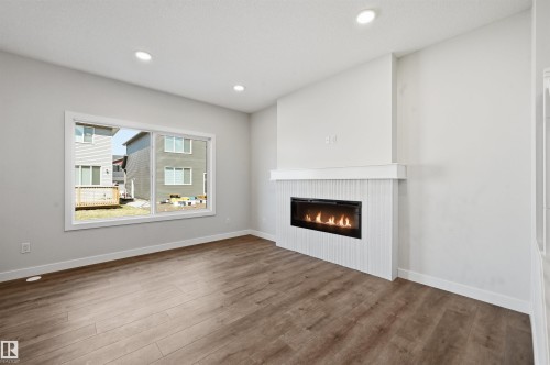 3024 Dixon Landing Sw, Edmonton, AB - Indoor Photo Showing Living Room With Fireplace