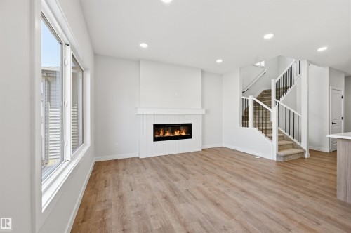 3024 Dixon Landing Sw, Edmonton, AB - Indoor Photo Showing Living Room With Fireplace