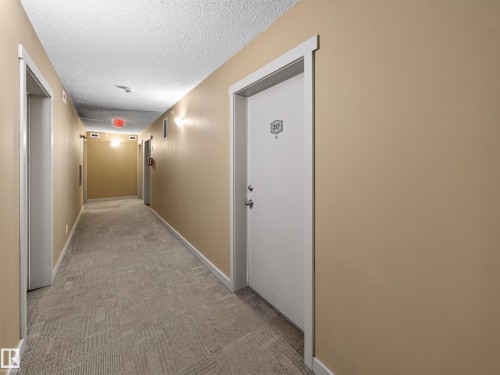 Corridor - #217 12045 22 Av Sw, Edmonton, AB - Indoor Photo Showing Other Room