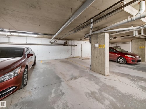 Garage - #217 12045 22 Av Sw, Edmonton, AB - Indoor Photo Showing Garage