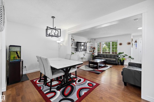 Open concept living area with wood-finish flooring - 2803 12 Street Nw, Edmonton, AB - Indoor