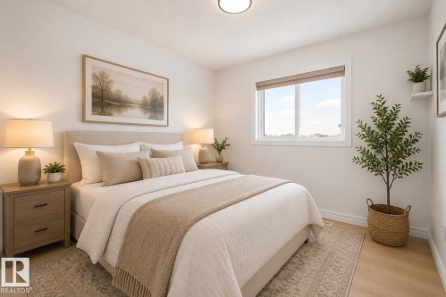 Bright bedroom featuring a large window with roller shade, light-toned wood-finish flooring, and a ceiling-mounted flush light fixture - 2803 12 Street Nw, Edmonton, AB - Indoor Photo Showing Bedroom