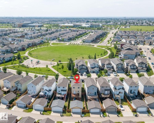 Aerial perspective of a developed residential community featuring detached garages and individual properties - 2803 12 Street Nw, Edmonton, AB - Outdoor With View
