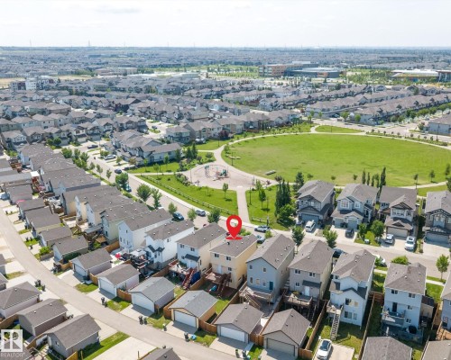 Aerial perspective showcasing the property's proximity to a green space with a playground - 2803 12 Street Nw, Edmonton, AB - Outdoor With View