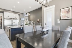 Dining room featuring recessed lighting - 