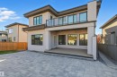 Rear view of property featuring a patio, stucco siding, and a balcony - 3167 Cameron Heights Way Nw, Edmonton, AB  - Outdoor With Balcony With Exterior 