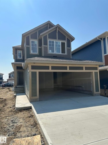 Newly constructed two-story residence featuring a two-car garage - 2357 Muckleplum Way Sw, Edmonton, AB - Outdoor