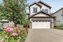 Contemporary two-story residence featuring light siding and a stone veneer accent - 1115 61 Street Sw, Edmonton, AB 