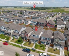 Residential neighborhood featuring detached homes with varied exterior finishes - 