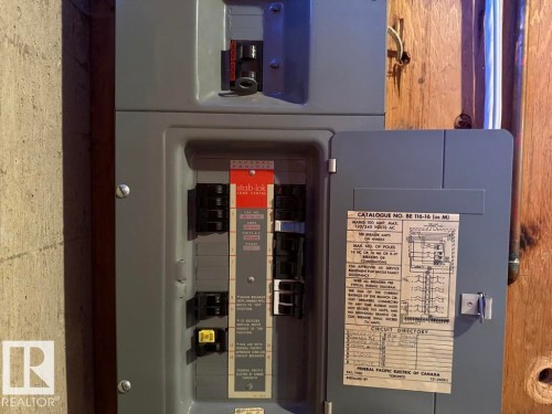 Electrical panel with circuit breakers - 9908 96A Avenue, Fort Saskatchewan, AB - Indoor