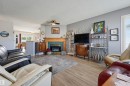 14903 128 Street Nw, Edmonton, AB  - Indoor Photo Showing Living Room With Fireplace 