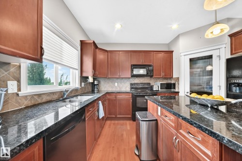 19 Victoria Bay, Spruce Grove, AB - Indoor Photo Showing Kitchen With Double Sink