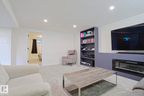 11142 51 Street Nw, Edmonton, AB - Indoor Photo Showing Living Room With Fireplace
