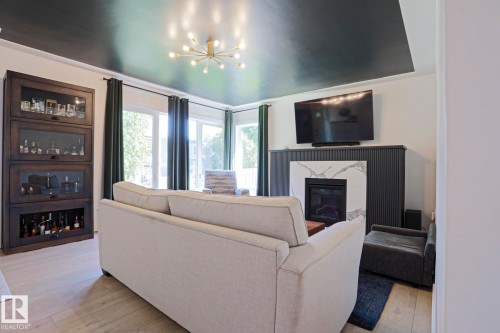 11142 51 Street Nw, Edmonton, AB - Indoor Photo Showing Living Room With Fireplace