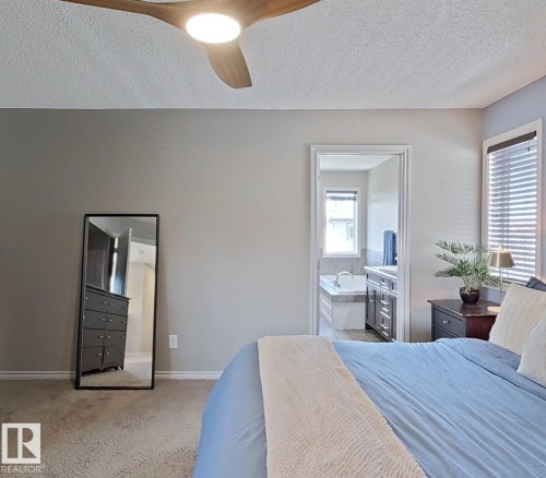 4006 Charles Place Sw, Edmonton, AB - Indoor Photo Showing Bedroom