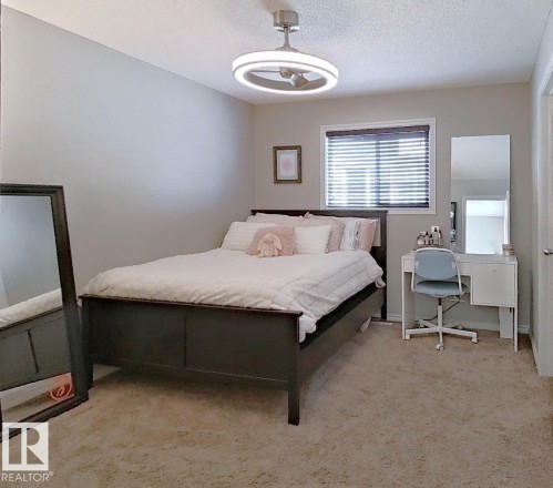 4006 Charles Place Sw, Edmonton, AB - Indoor Photo Showing Bedroom