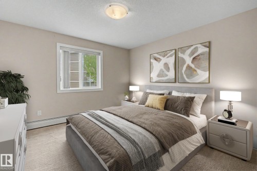 #105 240 Spruce Ridge Rd, Spruce Grove, AB - Indoor Photo Showing Bedroom