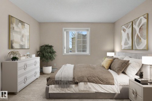 #105 240 Spruce Ridge Rd, Spruce Grove, AB - Indoor Photo Showing Bedroom