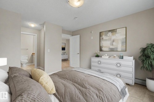 #105 240 Spruce Ridge Rd, Spruce Grove, AB - Indoor Photo Showing Bedroom