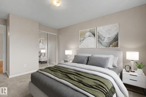 #105 240 Spruce Ridge Rd, Spruce Grove, AB - Indoor Photo Showing Bedroom
