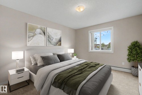 #105 240 Spruce Ridge Rd, Spruce Grove, AB - Indoor Photo Showing Bedroom